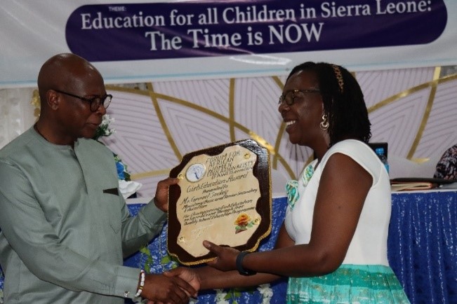 Read more about the article Minister Conrad Sackey Recognized as Champion of Girls’ Education by FAWE